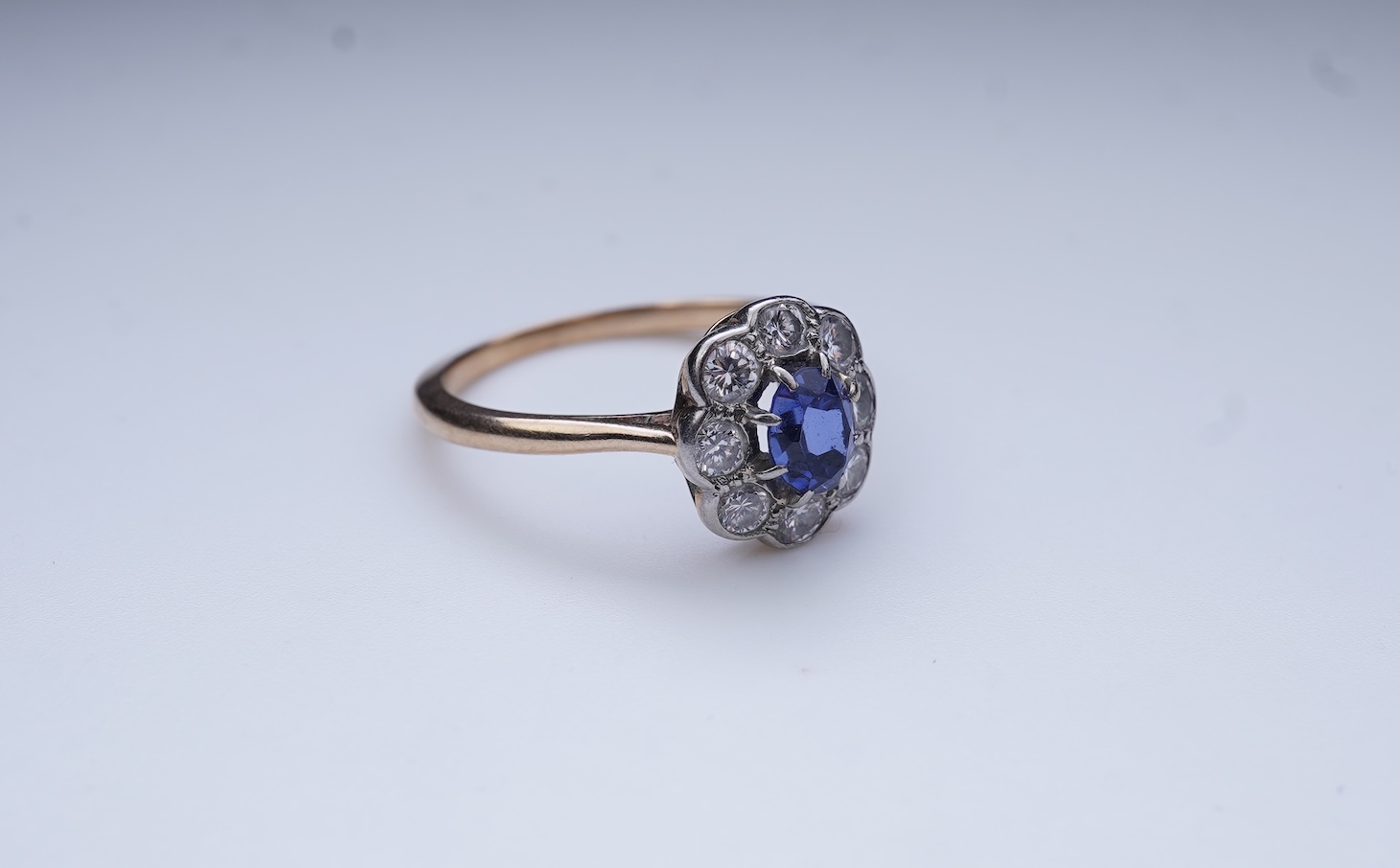 A synthetic sapphire and diamond ring